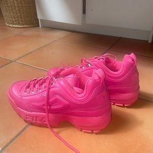 Neon pink fila disruptors